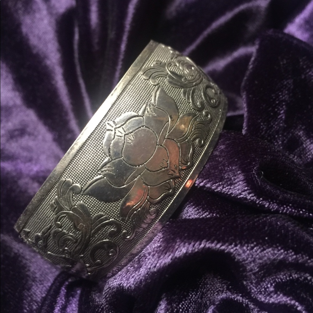 Carved cuff bracelet, lotus and crane